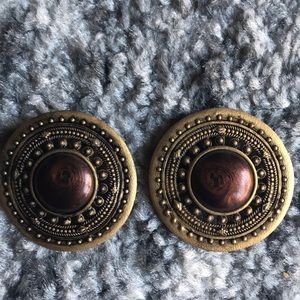 Gold stud earrings